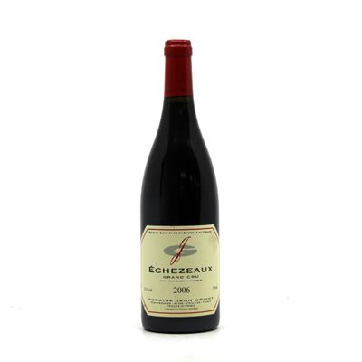 an image of a bottle of red wine on a white background