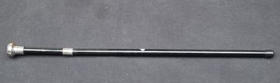 a close up of a baseball bat sitting on a table