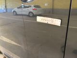 an image of a car parked in a parking garage