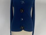 the jacket is blue and has black buttons on it