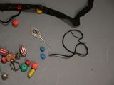 a pair of scissors, beads, and a pair of scissors on a table