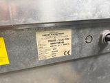 a close up of a metal box with a label on it