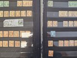 many stamps on the window of a building