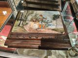 une vitrine sur laquelle figure la photo d'un homme et d'une femme