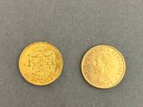 two gold coins, one of which is a sovereign and the other of which is a sovereign