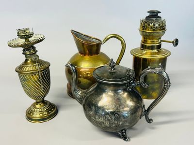 three different types of vases and a teapot on a table