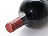 a bottle of wine that is sitting on a table