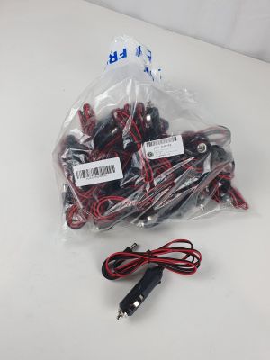 a bag of wires and a charger on a table
