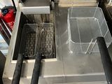 an image of a fryer with a basket in it