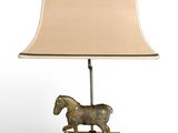 an image of a table lamp with a horse on it