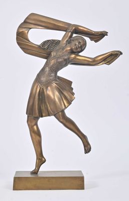 bronze statue of a woman holding a tennis racket on a wooden base