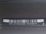 a bar code on the back of a car door handle