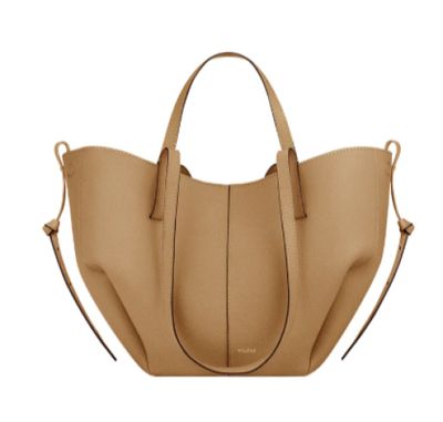 a tan leather tote bag on a white background