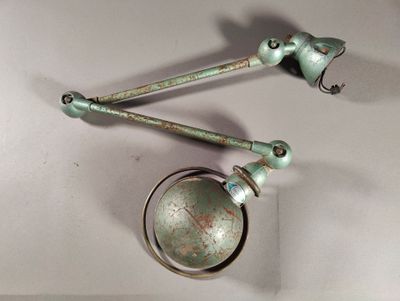 two spoons that are sitting on top of a table