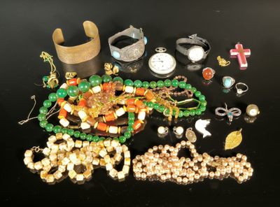 a lot of beads and bracelets on a table