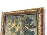 an image of a tapestry hanging on the wall of a room