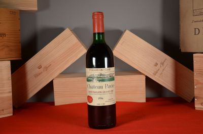 a bottle of wine that is sitting on a table