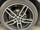 a close up view of a car ' s wheel and tire