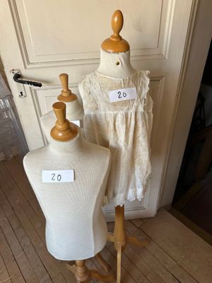 two mannequins that are on display in a room