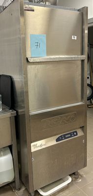 a stainless steel refrigerator in the middle of a kitchen