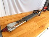 a pair of scissors sitting on top of a wooden table