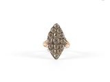a close up of a diamond ring on a white background