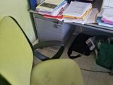 a chair that is sitting in front of a desk