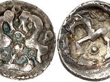 une pièce de monnaie en argent portant l'image d'un homme et d'une femme