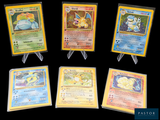 six different pokemon cards are displayed on a black background