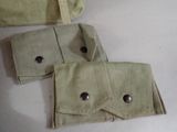 two bags that are sitting on a table