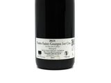 a bottle of wine that is sitting on a table