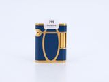 un briquet bleu et doré sur lequel figure le chiffre 29