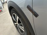a close up of a car door with a sticker on it