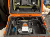 an orange case that has a camera inside of it