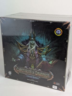world of warcraft card game box with a picture of a demon