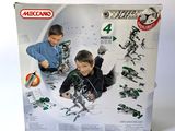 a box with a picture of a boy and a boy playing with legos