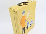 a yellow suitcase with a picture of a man and a car on it