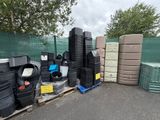 a lot of trash that is sitting on a pallet