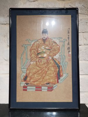 tableau représentant un homme assis sur une chaise dans une pièce, avec un mur en briques en arrière-plan