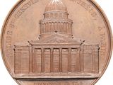 an image of a close up of a coin with a building in the background