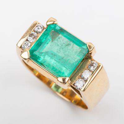 an emerald and diamond ring