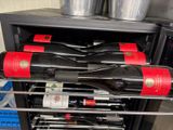 bottles of wine are stacked on top of each other in a wine cooler