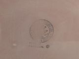 a close up of a stamp on a piece of paper