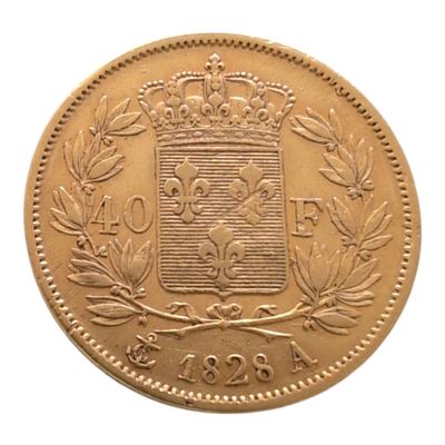 l'image d'une pièce d'or sur laquelle figurent des armoiries