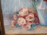 a painting of flowers in a vase next to a vase of flowers