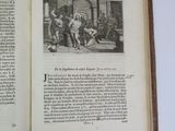 an open book with a picture of a group of people