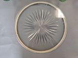 a glass plate with a starburst design on it