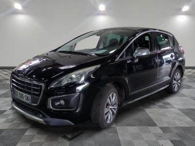 a picture of a black car parked in a garage