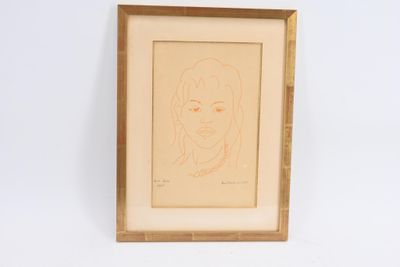 dessin représentant un homme barbu, encadré dans un cadre en bois accroché au mur