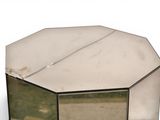 a small mirror that is sitting on a table